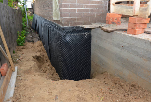 SJ Waterproofing Pros technician performing targeted Sump Pump Installation assessment in Lebanon, OR